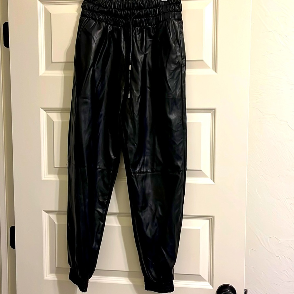 Never worn, super chic leather joggers!!
